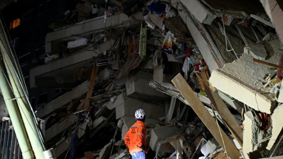 Mothers search, men weep amid debris of Venezuela quakes