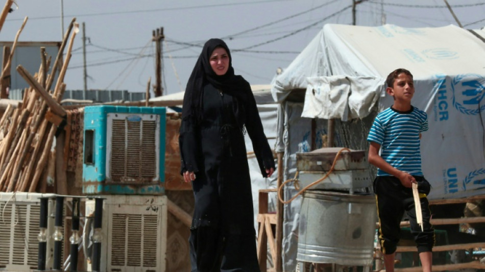 Iraqis face tough homecoming a decade after IS rampage