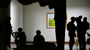Suspect detained in Philippine senate gunfire: police