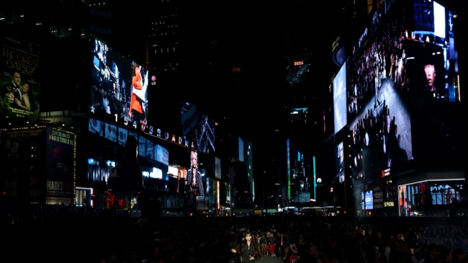 Gucci takes over New York's Times Square for fashion show